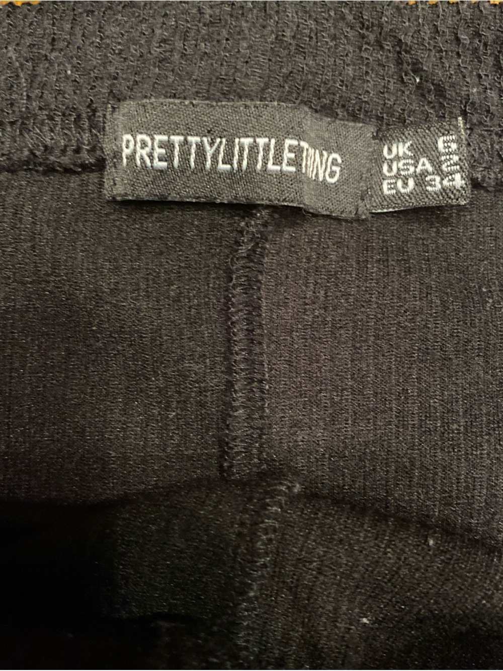 Pretty Little Thing Black Soft Ribbed Flare Slit Hem Leggings Sz 2 30” Inseam - Picture 4 of 6